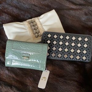 Set of three wallets/purse.  Brand new with tag